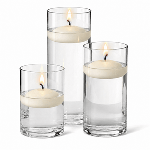 3 of 14: Cylinder Vase Centerpiece & Richland 3" Floating Candles Set of 18