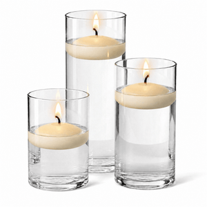 1 of 14: Cylinder Vase Centerpiece & Richland 3" Floating Candles Set of 18