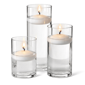 2 of 14: Cylinder Vase Centerpiece & Richland 3" Floating Candles Set of 18